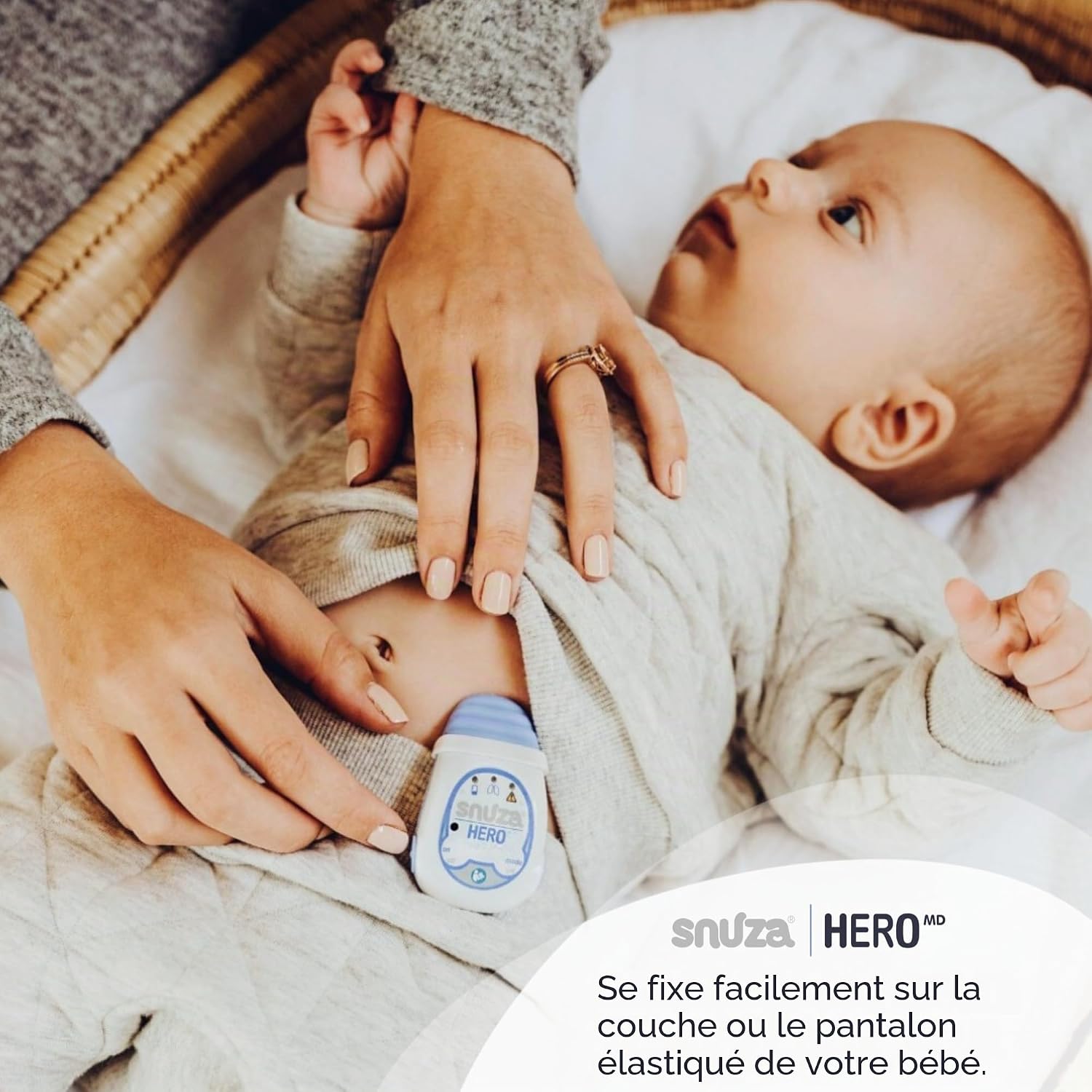 Détecteur de mouvements respiratoires Snuza Hero MD fixé à la couche